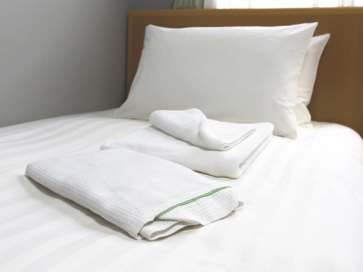 Business Hotel Sunpalace โตเกียว ภายนอก รูปภาพ